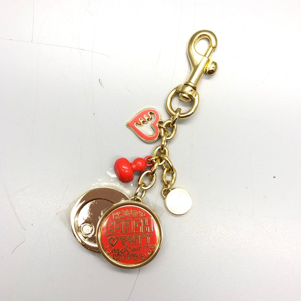 Coach keychain w playful charms